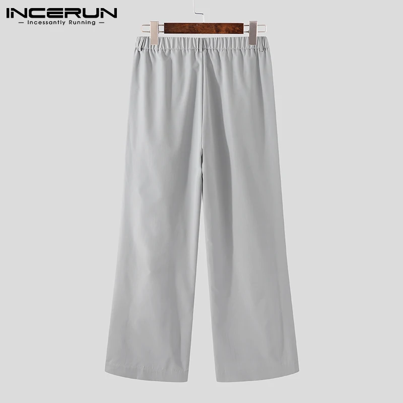 2021 Męskie Spodnie Do stóp Biegaczy Jednolity Kolor Ulica Wolna Elastyczna Talia Spodnie Split Nieregularne Moda Casual Pantalon INCERUN